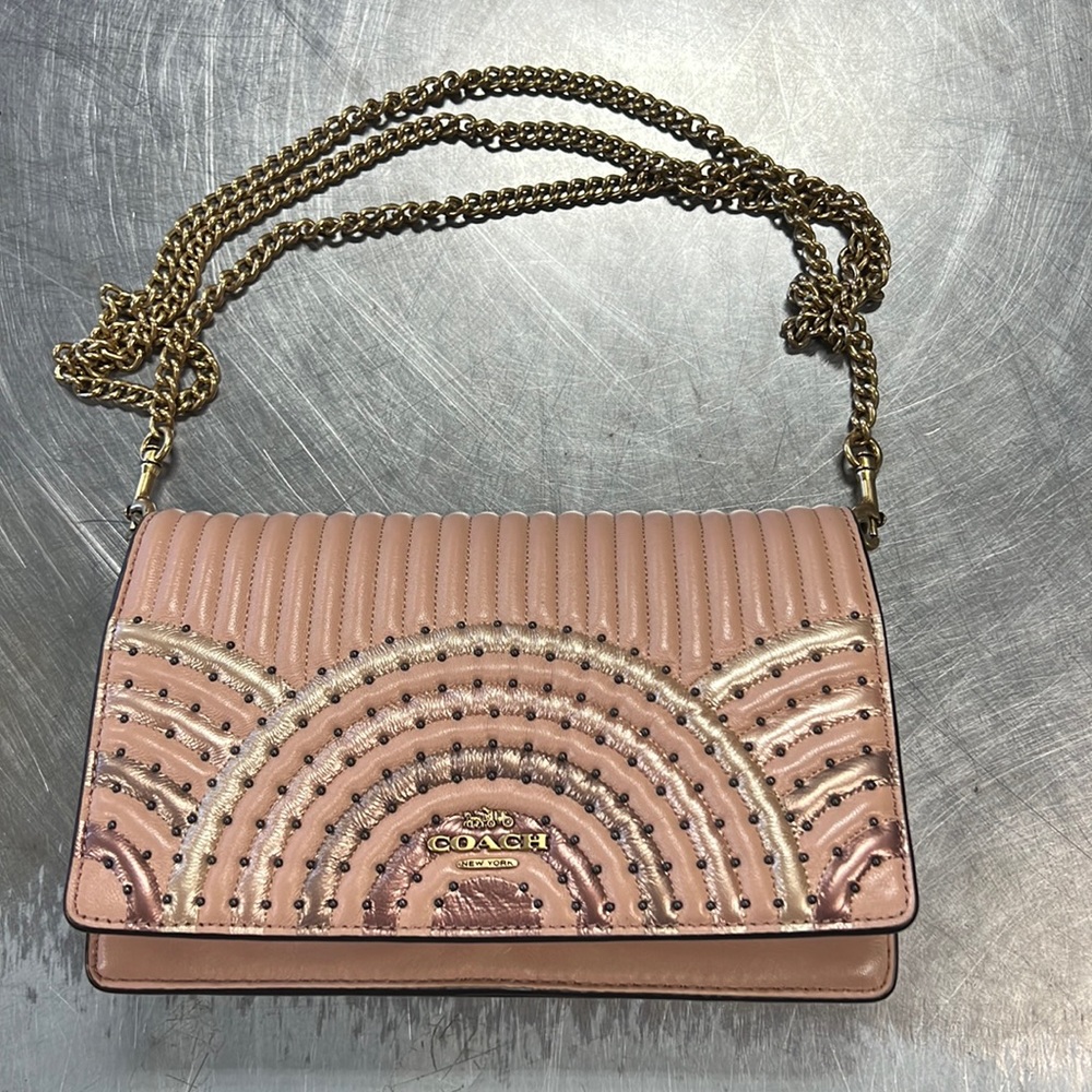 Like new Coach Leather Crossbody.  Lots of compartments in a compact purse!